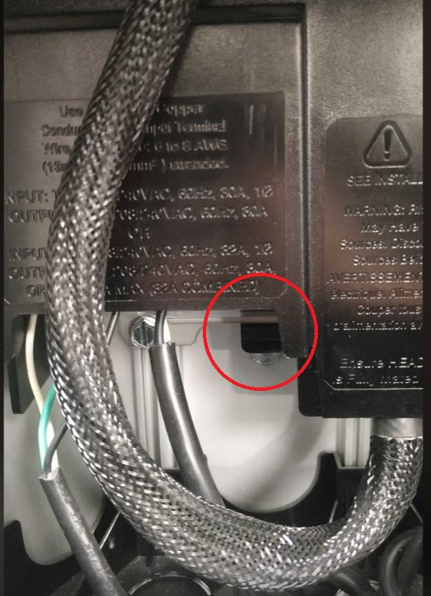 plastic tab Push this tab back and lift the black cover to expose the wiring block